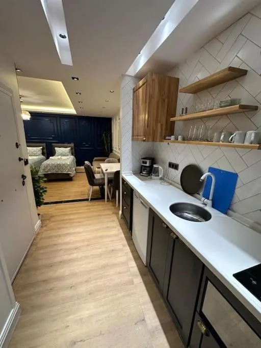 Image 3 of THE cozy, below street floor APT