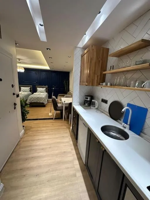 Image 5 of THE cozy, below street floor APT